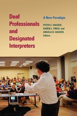 cover of Deaf Professionals and Designated Interpreters: A New Paradigm