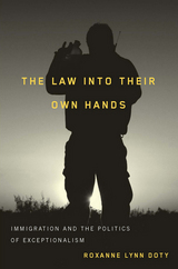 front cover of The Law Into Their Own Hands