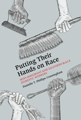 front cover of Putting Their Hands on Race